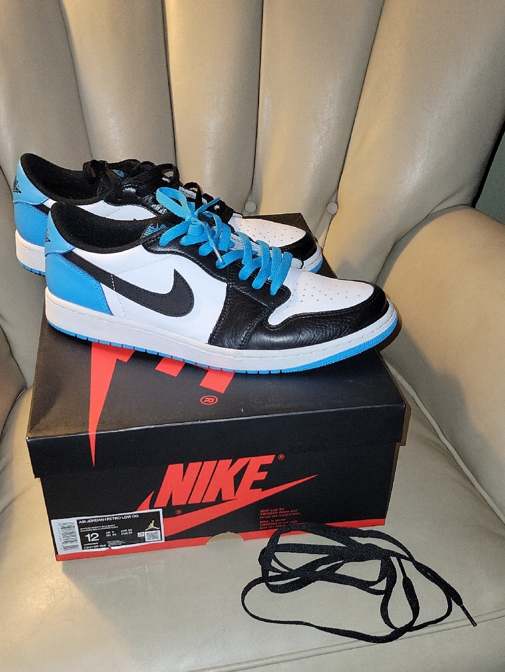 Nike Low-Top Sneakers in White, Black, and Bright Blue